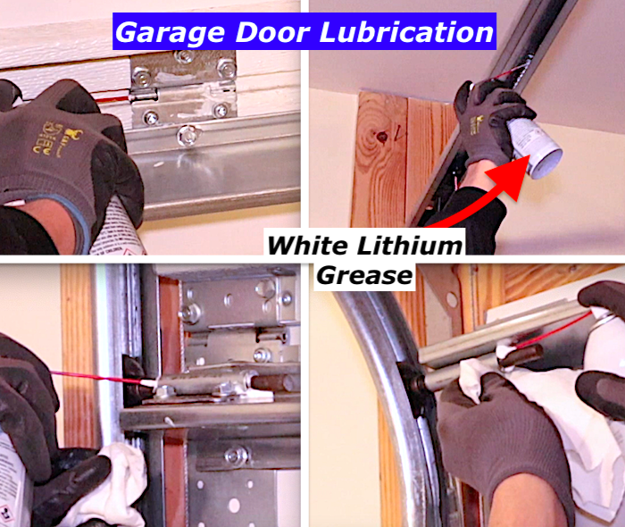 Applying white lithium grease to garage door hardware after TorqueMaster Plus spring installation